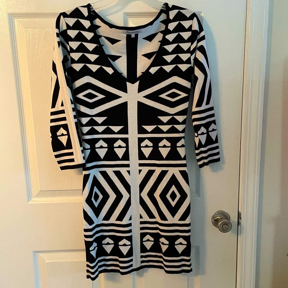 Black and white fitted mini dress
